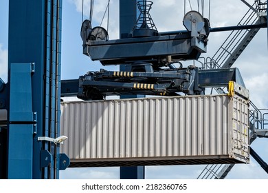 40 Ft Intermodal Container Being Lifted By Spreader In Seaport