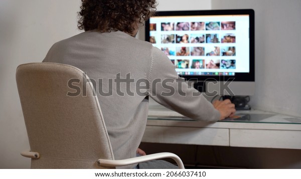 40 year old business man watching porn video on Internet\
 at home during smart working due Covid-19 Coronavirus outbreak\
