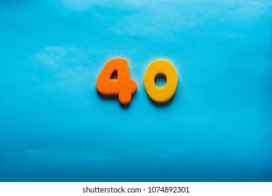 40 years old celebrating classic logo. Colored forty happy numbers. Greetings celebrates card. Traditional digits of ages.  Sale, birthday, special prize, % off concept.