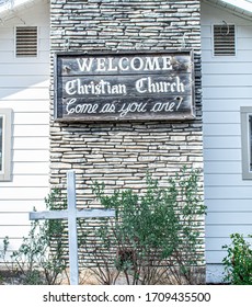 4-1-2020 - Wimberley, TX - Wooden  church sign to welcome all people into the church building.