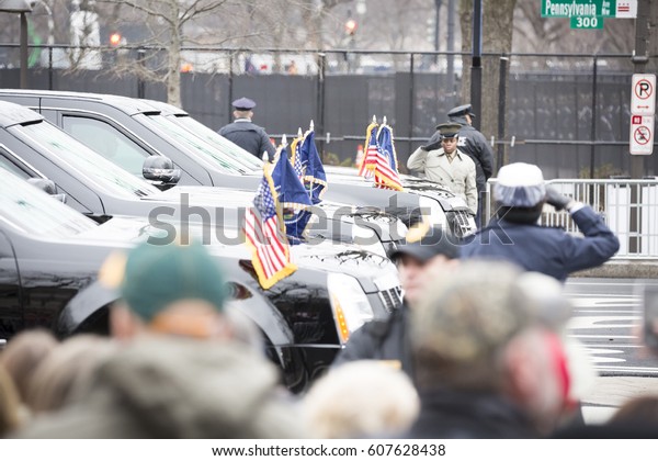 45th Presidential\
Inauguration, Donald Trump: Flags on the Presidential Motorcade\
vehicles during the parade on Pennsylvania Ave, NW WASHINGTON DC -\
JAN 20 2017