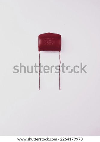 474J 250V non polarized capacitor non polar capacitor the main subject is out of focus 