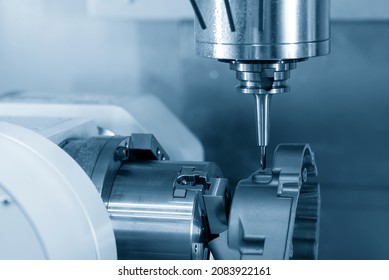 The 4-axis  machining center cutting the aluminum gear housing parts by solid ball end mill tool. The hi-precision automotive parts manufacturing process by multi-axis CNC milling machine.