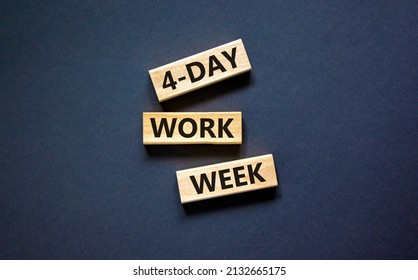 4-day Work Week Symbol. Concept Words 4-day Work Week On Wooden Blocks On Beautiful Black Table Black Background. Copy Space. Business And 4-day Work Week And Short Workweek Concept.