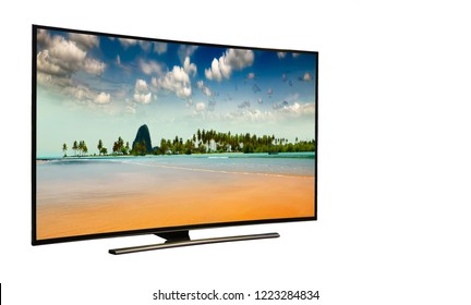 4k monitor isolated on white.  Andaman Sea, Phuket Island. Thailand.. Modern, elegant TV 4 K, with incredibly beautiful colors of the image ..