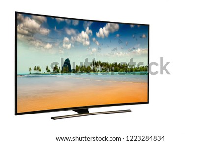 4k monitor isolated on white.  Andaman Sea, Phuket Island. Thailand.. Modern, elegant TV 4 K, with incredibly beautiful colors of the image ..