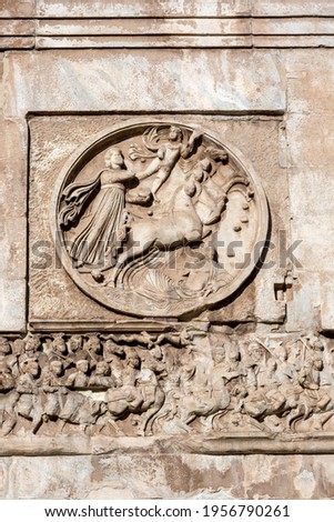 4th century Arch of Constantine, (Arco di Costantino) next to Colosseum, details of the attic, Rome, Italy