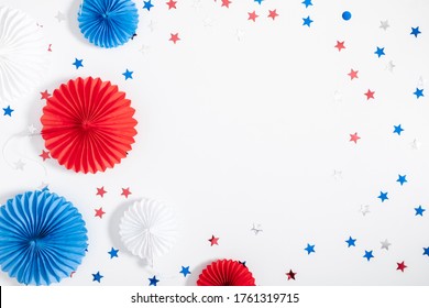 4th Of July American Independence Day. Happy Independence Day. Red, Blue And White Star Confetti, Paper Decorations On White Background. Flat Lay, Top View, Copy Space