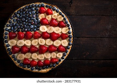 4th Of July Concept Pie With American Flag White Fruit On Wooden Background With Blank Space