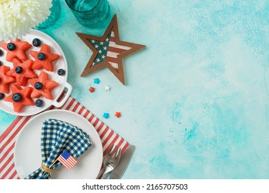 4th Of July Festive Table Setting  With Summer Fruit Salad, Plate And Decorations. Happy Independence Day Party Background. Top View, Flat Lay