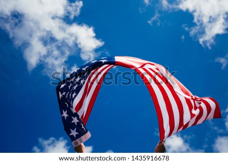 4th of July - Independence day. American flag blown in the wind.