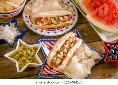 4th Of July Picnic Table With Hot Dogs, Chips, Watermelon And Lemonade Shot From Above