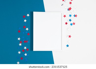 4th of July, USA Presidents Day, Independence Day, Memorial day, US election concept. Blank photo frame, confetti stars on blue and white background. Flat lay, top view, copy space, banner - Shutterstock ID 2311537125