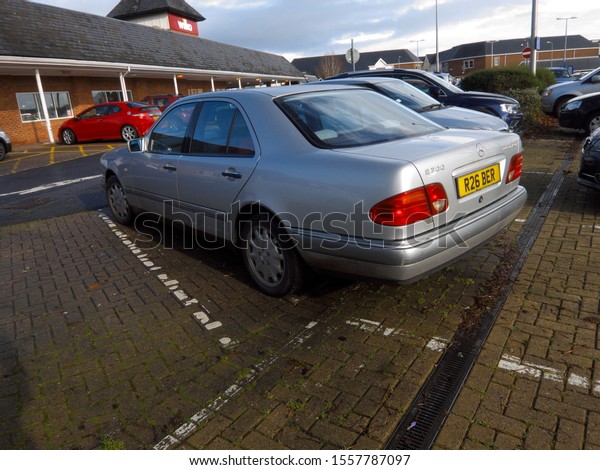 4th\
November 2019- A Mercedes E300 Turbo Diesel, four door saloon car,\
parked in the public carpark at a shopping precinct in the town\
centre at Carmarthen, Carmarthenshire, Wales, UK.\
