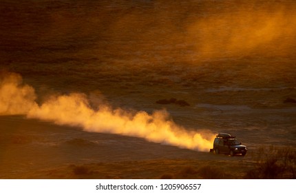 A 4WD Vehicle Attempts To Climb The 'Big Red' Sand Dune In Outback Australia