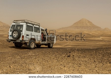 4WD vehicle in a desert near Bahariya oasis, Egypt