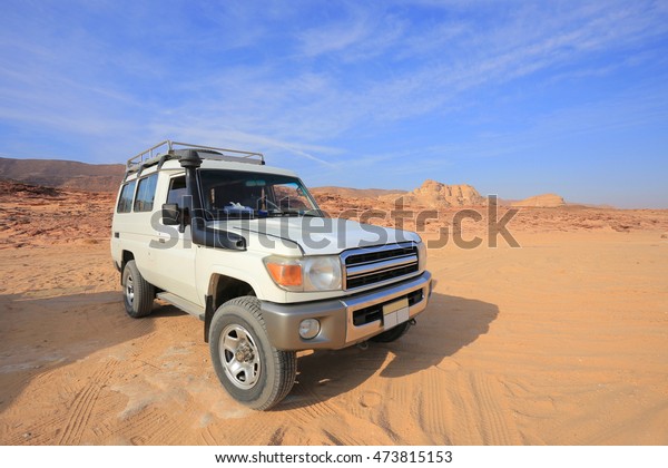 4x4 Jeep Toyota Land Cruiser. Off road car in the\
desert in Egypt