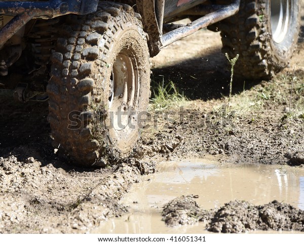  4x4 vehicle with
tires full of mud