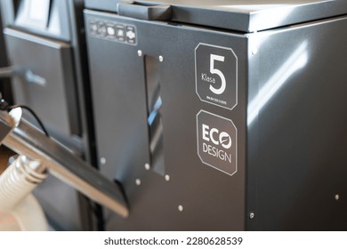 5 class Ecodesign solid fuel boiler for wood pellet, wooden pellets closeup