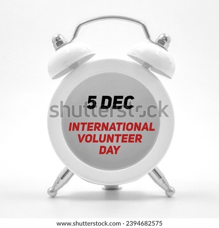 5 December international volunteer day inscribed over clock 