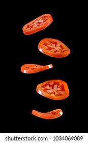 5 Flying tomato slices - Shutterstock ID 1034069089
