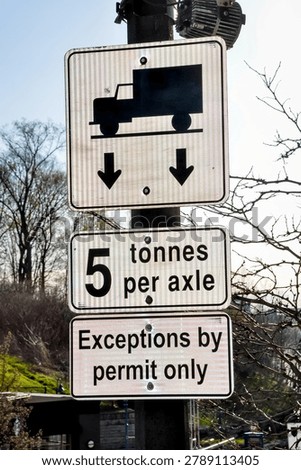 5 tonnes per axle and exceptions by permit only signs posted on the metal pole