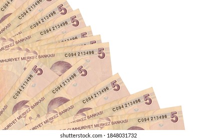 5 Turkish liras bills lies isolated on white background with copy space stacked in fan close up - Shutterstock ID 1848031732