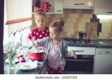 5 Years Old Twins Cooking Holiday Pie In The Kitchen, Casual Lifestyle Photo Series In Real Life Interior