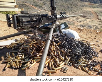 50 Cal Machine gun with spent brass around it