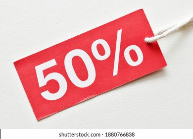 50% Discount On Red Tag And White Background. Concept In Business - Time For Discounts And Promotions.