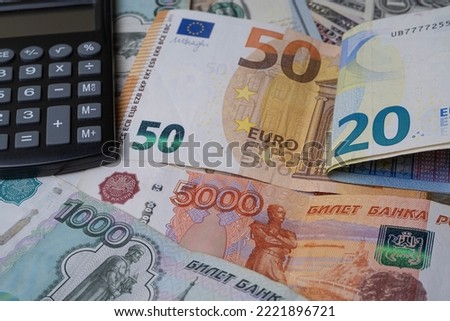 50 euro banknotes and Russian ruble cash, close-up