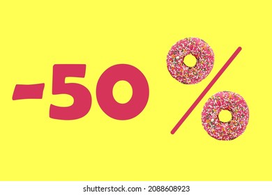 50 percent daily bakery discount on pastries. Percent sign is made of donuts in strawberry glaze with multi-colored backlighting. Creative bakery advertisement, zero waste production concept.