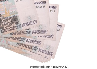 50 russian rubles bills lies in small bunch or pack isolated on white. Mockup with copy space. Business and currency exchange - Shutterstock ID 1832750482