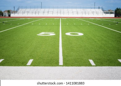 50 Yard Line On Empty American Football Field Stadium In Texas