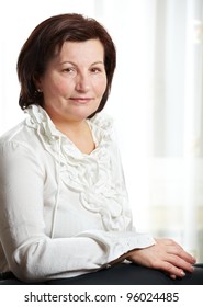 50 Year Old Beautiful Business Woman Portrait At The Office.