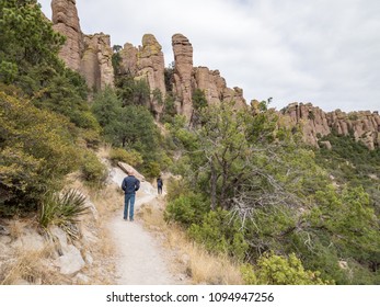 50 Year Old Man And 10 Year Old Son, Hiker On Echo Canyon Trail, Chiricahua National Monument, Near Willcox, Cochise County, Arizona, USA