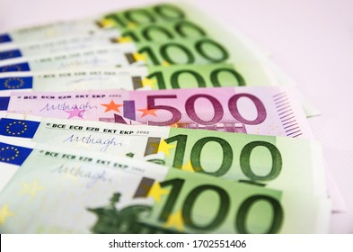 500 Euro banknote among 100 Euro banknotes. - Shutterstock ID 1702551406