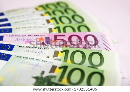 500 Euro banknote among 100 Euro banknotes.