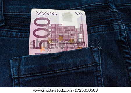 500 euro banknote in a jeans pocket - pocket money