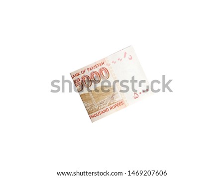 5000 Rupees Pakistani Currency Note folded and isolated on white background
