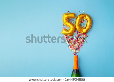 50th anniversary champagne bottle balloon pop