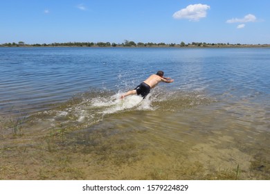 52 Year Old Man Jumping Inside The Bridal Pond, Playing In The Water