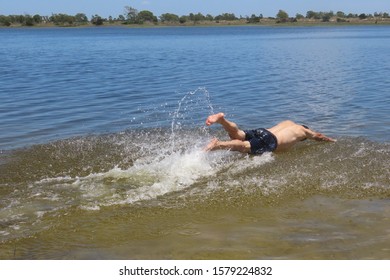 52 Year Old Man Jumping Inside The Bridal Pond, Playing In The Water