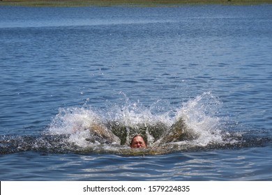 52 Year Old Man Jumping Inside The Bridal Pond, Playing In The Water