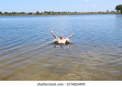 52 Years Old Man Jumping Into The Water In The Sailors Island In Southern Brazil