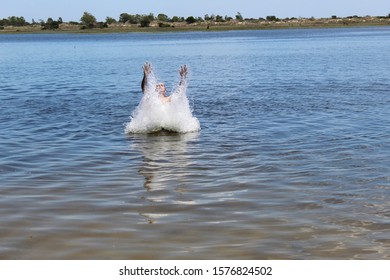 52 Years Old Man Jumping Into The Water In The Sailors Island In Southern Brazil