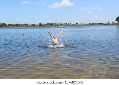 52 Years Old Man Jumping Into The Water In The Sailors Island In Southern Brazil