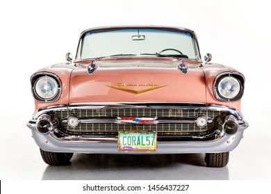 57 chevy front.  front on photo of a 1957 Chevrolet Belair well restored vintage American car isolated on white.
