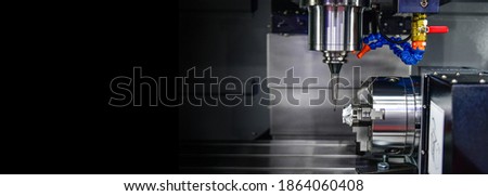 The 5-axis CNC mills machines for design configuration that utilizes a swivel head machine table and flush with the surface metalworking industrial, free space on left side for text
