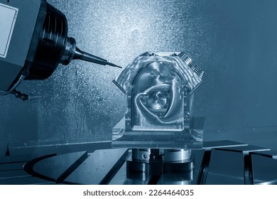 The 5-axis machining center cutting the V8 engine cylinder block with solid ball end mill tool. The hi-precision automotive manufacturing process by multi-axis CNC milling machine.